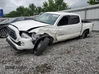 2022 Toyota Tacoma SR with VIN 3TYAX5GN7NT043385, listed as a Copart auction lot 61354345 with 79,166 mi miles and Salvage title. Bid and sale history available at DreamBid. Image 1.