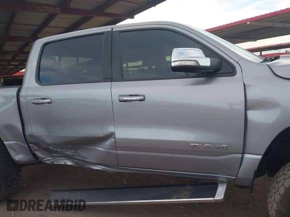 2019 Ram 1500 Big Horn with VIN 1C6RREFT4KN828335, listed as a IAAI auction lot 42170532 with 76,593 mi miles and . Bid and sale history available at DreamBid. Image 13.