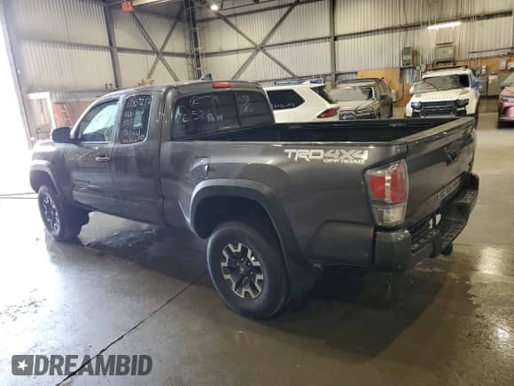 2022 Toyota Tacoma SR z VIN 3TYSZ5AN6NT075851, wystawiony jako Copart lot #67509485 z przebiegiem 94 512 mil mil oraz Czysty tytuł • Clean title. Historia ofert i sprzedaży dostępna na DreamBid. Obrazek 2.