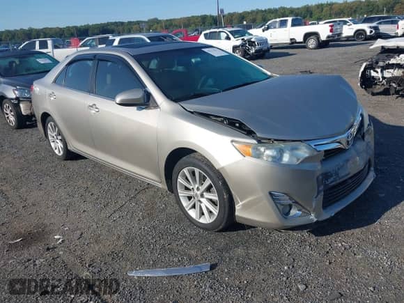 2014 Toyota Camry XLE with VIN 4T4BF1FK2ER404344, listed as a IAAI auction lot 43212372 with 81,400 mi miles and . Bid and sale history available at DreamBid. Image 1.