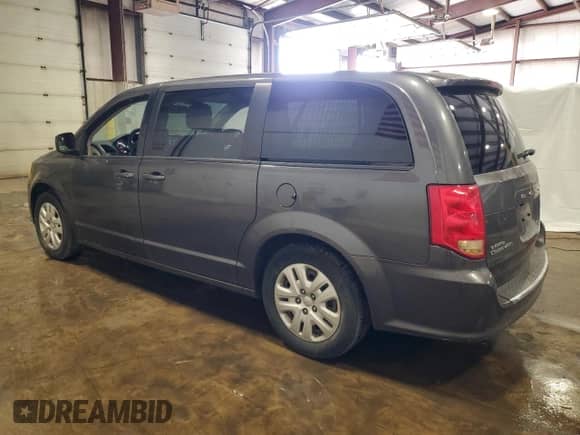 2018 Dodge Grand Caravan SE z VIN 2C4RDGBG5JR312871, wystawiony jako Copart lot #69593385 z przebiegiem 159 455 mil mil oraz Czysty tytuł • Clean title. Historia ofert i sprzedaży dostępna na DreamBid. Obrazek 2.
