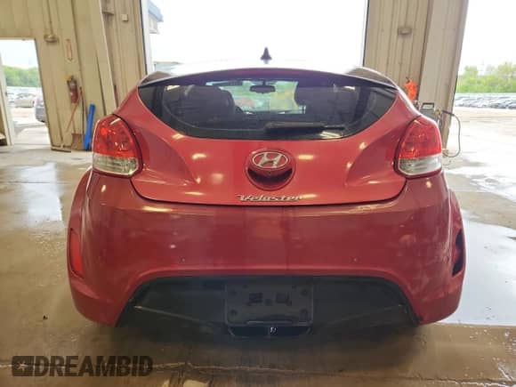 2013 Hyundai Veloster w/Black Int z VIN KMHTC6AD1DU167261, wystawiony jako Copart lot #63744355 z przebiegiem 121 478 mil mil oraz Czysty tytuł • Clean title. Historia ofert i sprzedaży dostępna na DreamBid. Obrazek 6.