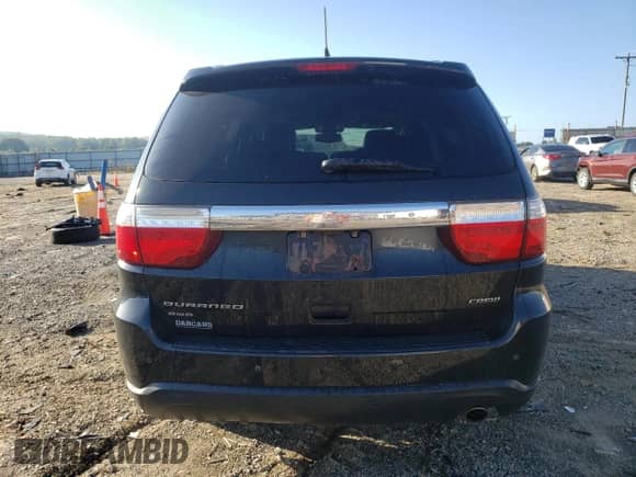 2012 Dodge Durango Crew with VIN 1C4RDJDG1CC163588, listed as a Copart auction lot 81885615 with 288,814 mi miles and Salvage title. Bid and sale history available at DreamBid. Image 6.