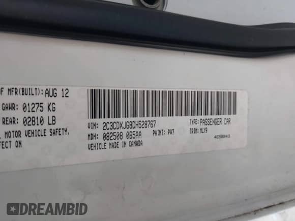 2013 Dodge Charger SXT with VIN 2C3CDXJG8DH528767, listed as a IAAI auction lot 41627596 with 204,619 mi miles and . Bid and sale history available at DreamBid. Image 9.