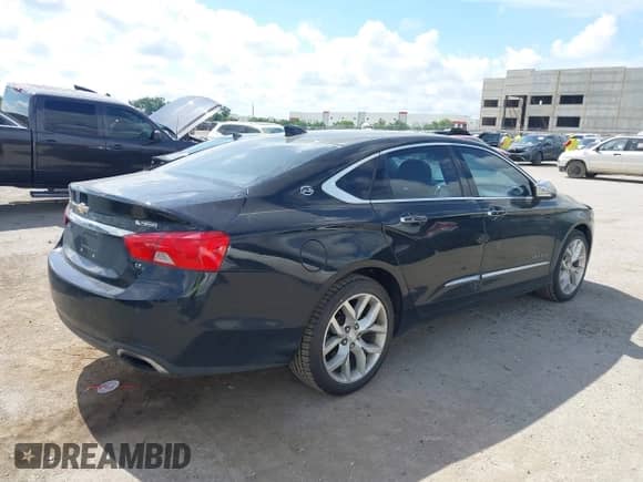 2017 Chevrolet Impala Premier with VIN 1G1145S3XHU189895, listed as a IAAI auction lot 42582713 with 100,179 mi miles and . Bid and sale history available at DreamBid. Image 4.