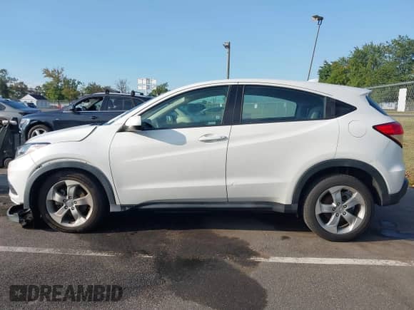 2020 Honda HR-V LX with VIN 3CZRU6H35LM703263, listed as a IAAI auction lot 43173973 with 96,857 mi miles and . Bid and sale history available at DreamBid. Image 14.
