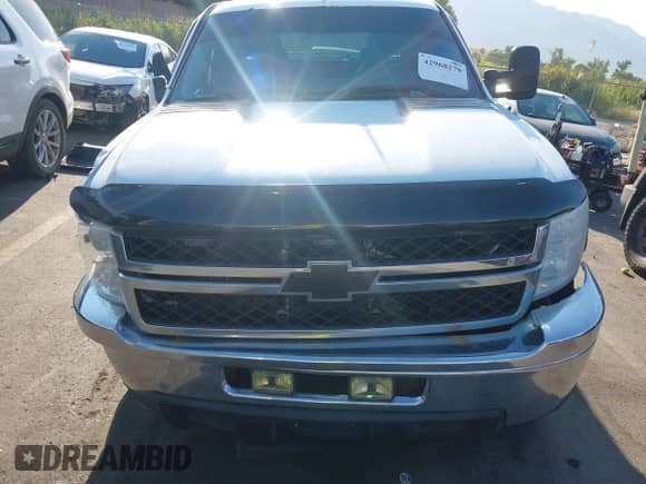 2014 Chevrolet Silverado 2500HD Work Truck z VIN 1GC1KVCG6EF144919, wystawiony jako IAAI lot #42968279 z przebiegiem 145 810 mil mil oraz . Historia ofert i sprzedaży dostępna na DreamBid. Obrazek 13.