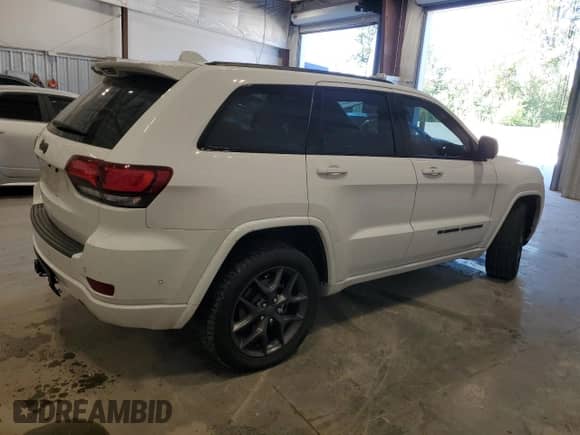 2021 Jeep Grand Cherokee 80th Anniversary with VIN 1C4RJFBGXMC810113, listed as a Copart auction lot 70051315 with 112,187 mi miles and Salvage title. Bid and sale history available at DreamBid. Image 3.