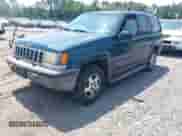 1994 Jeep Grand Cherokee Laredo with VIN 1J4GZ58Y5RC145018, listed as a IAAI auction lot 42590945 with 266,020 mi miles and . Bid and sale history available at DreamBid. Image 2.