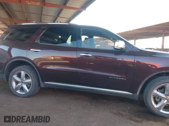 2012 Dodge Durango Citadel with VIN 1C4SDJET7CC337676, listed as a IAAI auction lot 42893927 with 160,094 mi miles and . Bid and sale history available at DreamBid. Image 13.