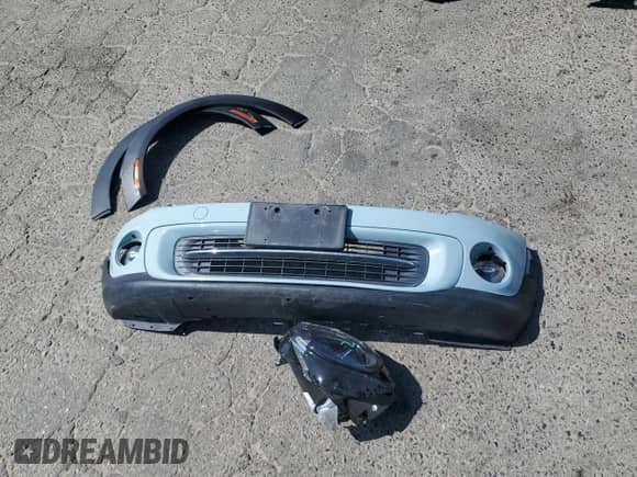 2011 MINI Hardtop with VIN WMWSU3C52BT096248, listed as a Copart auction lot 62008285 with 129,794 mi miles and Salvage title. Bid and sale history available at DreamBid. Image 12.