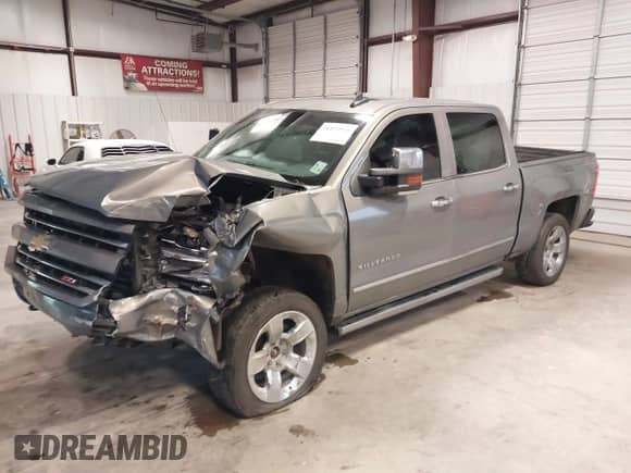 2017 Chevrolet Silverado 1500 LTZ z VIN 3GCUKSEJ4HG328926, wystawiony jako IAAI lot #41125958 z przebiegiem 248 071 mil mil oraz . Historia ofert i sprzedaży dostępna na DreamBid. Obrazek 23.