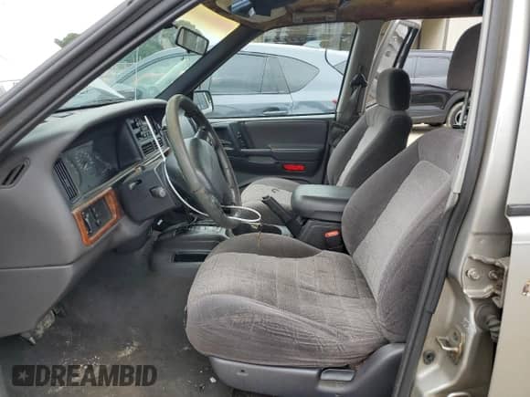 1998 Jeep Grand Cherokee Laredo с VIN 1J4FX58S7WC350624, выставлен на аукционе Copart как лот 63063624 с пробегом Не указан миль и Списание • Salvage title. История ставок и продаж доступна на DreamBid. Изображение 7.