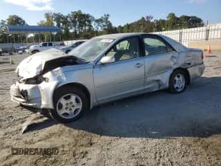 2003 Toyota Camry LE with VIN 4T1BF32K73U554801, listed as a Copart auction lot 81187395 with Not provided miles and Salvage title. Bid and sale history available at DreamBid. Image 1.