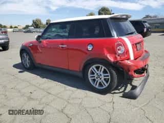 2011 MINI Hardtop S with VIN WMWSV3C50BTY12562, listed as a Copart auction lot 61183425 with 125,126 mi miles and Salvage title. Bid and sale history available at DreamBid. Image 2.