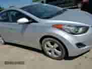 2011 Hyundai Elantra GLS z VIN KMHDH4AE7BU154997, wystawiony jako Copart lot #66558955 z przebiegiem 165 913 mil mil oraz Szkoda całkowita • Salvage title. Historia ofert i sprzedaży dostępna na DreamBid. Obrazek 13.
