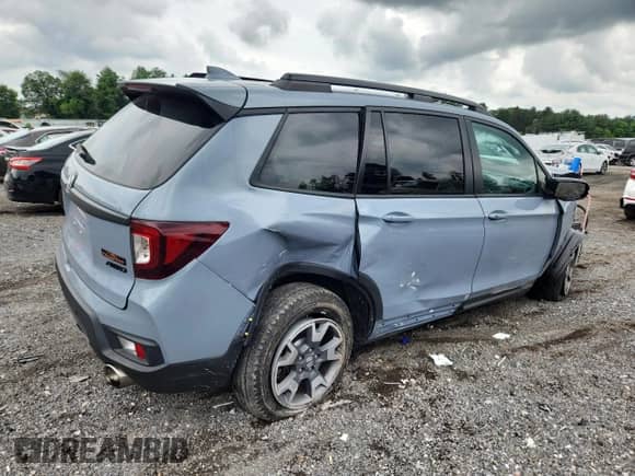 2023 Honda Passport TrailSport с VIN 5FNYF8H63PB022336, выставлен на аукционе Copart как лот 63269705 с пробегом Не указан миль и Списание • Salvage title. История ставок и продаж доступна на DreamBid. Изображение 3.