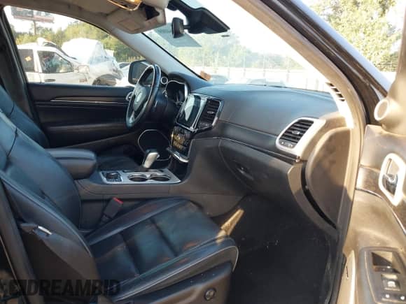 2019 Jeep Grand Cherokee Summit with VIN 1C4RJFJT7KC674874, listed as a IAAI auction lot 43164009 with 105,327 mi miles and . Bid and sale history available at DreamBid. Image 5.