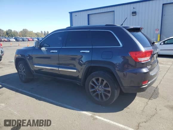 2013 Jeep Grand Cherokee Limited with VIN 1C4RJFBG1DC638666, listed as a Copart auction lot 85532785 with 210,478 mi miles and Clean title. Bid and sale history available at DreamBid. Image 2.
