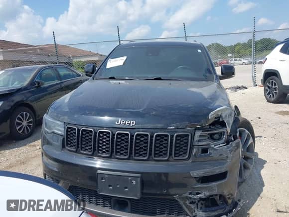 2018 Jeep Grand Cherokee Overland with VIN 1C4RJFCG9JC357564, listed as a IAAI auction lot 42902786 with 118,665 mi miles and . Bid and sale history available at DreamBid. Image 12.