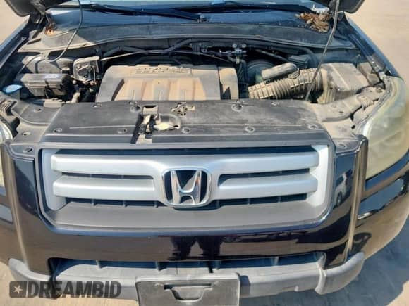 2006 Honda Pilot EX-L z VIN 5FNYF28506B048699, wystawiony jako Copart lot #71624605 z przebiegiem 187 755 mil mil oraz Czysty tytuł • Clean title. Historia ofert i sprzedaży dostępna na DreamBid. Obrazek 12.