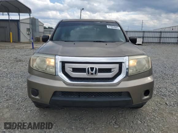2011 Honda Pilot LX z VIN 5FNYF3H2XBB024268, wystawiony jako Copart lot #81864065 z przebiegiem 243 782 mil mil oraz Czysty tytuł • Clean title. Historia ofert i sprzedaży dostępna na DreamBid. Obrazek 5.