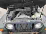 1998 Jeep Wrangler SE z VIN 1J4FY29P1WP763752, wystawiony jako Copart lot #70510885 z przebiegiem 228 480 mil mil oraz Szkoda całkowita • Salvage title. Historia ofert i sprzedaży dostępna na DreamBid. Obrazek 11.