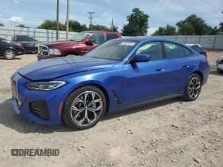 2023 BMW i4 eDrive40 with VIN WBY73AW0XPFR09288, listed as a Copart auction lot 68935395 with 24,059 mi miles and Salvage title. Bid and sale history available at DreamBid. Image 1.