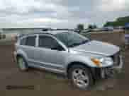 2009 Dodge Caliber SXT z VIN 1B3HB48AX9D181259, wystawiony jako Copart lot #80146215 z przebiegiem 94 695 mil mil oraz Szkoda całkowita • Salvage title. Historia ofert i sprzedaży dostępna na DreamBid. Obrazek 4.