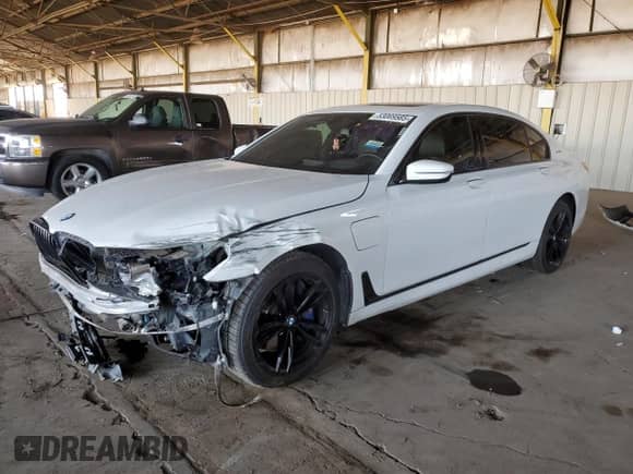 2018 BMW 7 Series 740e xDrive with VIN WBA7J2C58JG938333, listed as a Copart auction lot 53069585 with 216,353 mi miles and Clean title. Bid and sale history available at DreamBid. Image 1.
