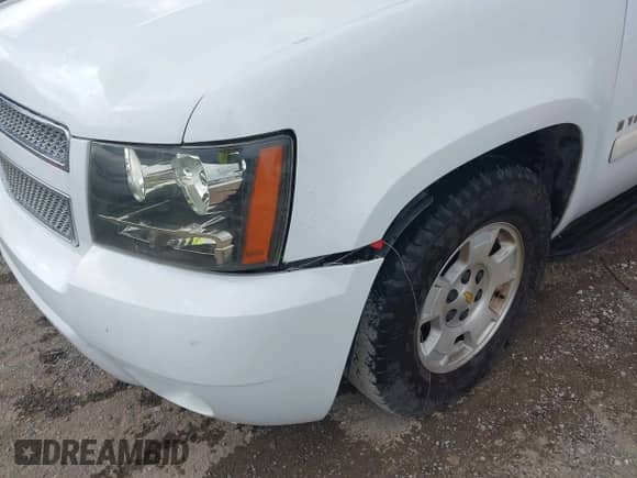 2007 Chevrolet Tahoe LTZ with VIN 1GNFC13017R113004, listed as a IAAI auction lot 43217116 with 161,939 mi miles and . Bid and sale history available at DreamBid. Image 6.
