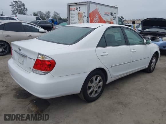 2005 Toyota Camry LE with VIN 4T1BF32K35U608730, listed as a IAAI auction lot 42843202 with 155,011 mi miles and . Bid and sale history available at DreamBid. Image 4.