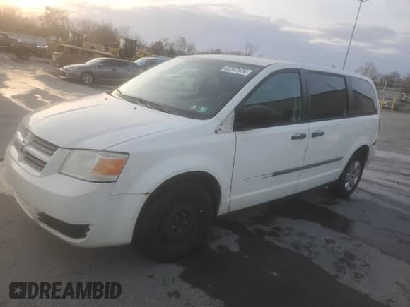 2009 Dodge Caravan with VIN 2D8HN11E89R624380, listed as a Copart auction lot 82383474 with 104,912 mi miles and Clean title. Bid and sale history available at DreamBid. Image 1.