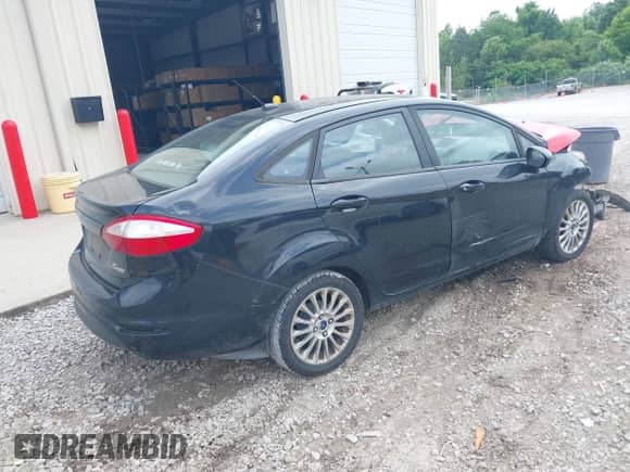 2014 Ford Fiesta S with VIN 3FADP4AJ8EM201618, listed as a IAAI auction lot 42234592 with 170,203 mi miles and . Bid and sale history available at DreamBid. Image 4.