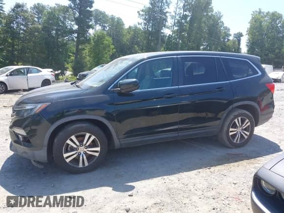 2017 Honda Pilot EX with VIN 5FNYF6H38HB005950, listed as a IAAI auction lot 42757387 with 133,333 mi miles and . Bid and sale history available at DreamBid. Image 13.