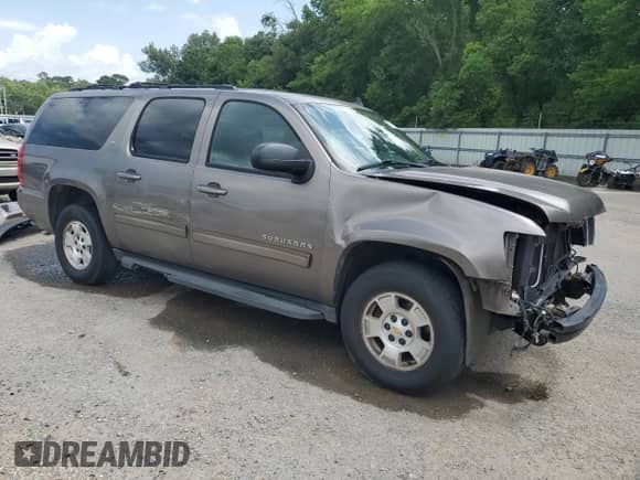 2011 Chevrolet Suburban LT с VIN 1GNSCJE01BR259214, выставлен на аукционе Copart как лот 63521135 с пробегом 119 625 миль миль и Списание • Salvage title. История ставок и продаж доступна на DreamBid. Изображение 4.