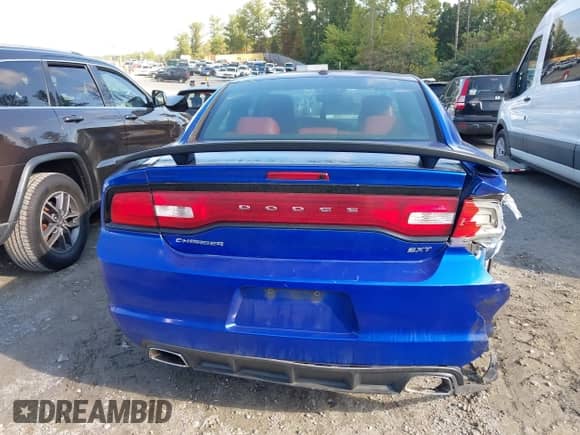 2014 Dodge Charger SXT with VIN 2C3CDXHG9EH369698, listed as a IAAI auction lot 43302967 with 290,101 mi miles and . Bid and sale history available at DreamBid. Image 16.