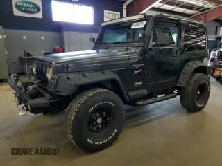 1999 Jeep Wrangler Sport с VIN 1J4FY19S0XP487645, выставлен на аукционе Copart как лот 84068725 с пробегом 197 001 миль миль и Чистый • Clean title. История ставок и продаж доступна на DreamBid. Изображение 1.