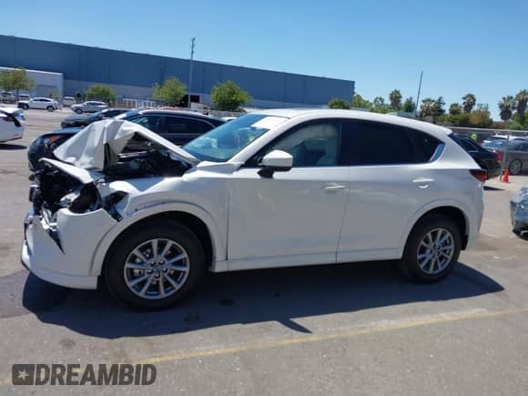 2025 Mazda CX-5 S Preferred z VIN JM3KFBCL3S0667079, wystawiony jako IAAI lot #42744908 z przebiegiem 676 mil mil oraz . Historia ofert i sprzedaży dostępna na DreamBid. Obrazek 14.