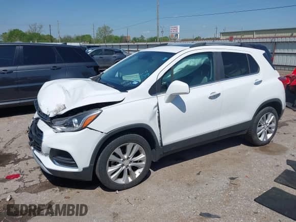 2017 Chevrolet Trax Premier z VIN 3GNCJRSB0HL191549, wystawiony jako IAAI lot #41859805 z przebiegiem 57 784 mil mil oraz . Historia ofert i sprzedaży dostępna na DreamBid. Obrazek 16.