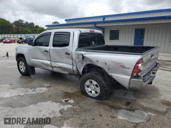 2011 Toyota Tacoma with VIN 3TMLU4EN1BM064092, listed as a Copart auction lot 86248815 with 127,908 mi miles and Salvage title. Bid and sale history available at DreamBid. Image 2.