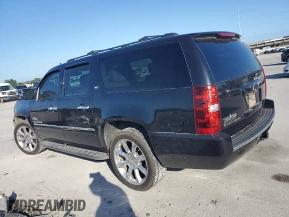2011 Chevrolet Suburban LTZ with VIN 1GNSCKE05BR320599, listed as a Copart auction lot 64181955 with 196,199 mi miles and Salvage title. Bid and sale history available at DreamBid. Image 2.