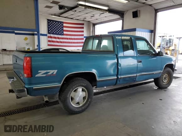1997 GMC Sierra 1500 с VIN 2GTEK19R1V1555882, выставлен на аукционе Copart как лот 80388325 с пробегом 140 233 миль миль и Списание • Salvage title. История ставок и продаж доступна на DreamBid. Изображение 3.