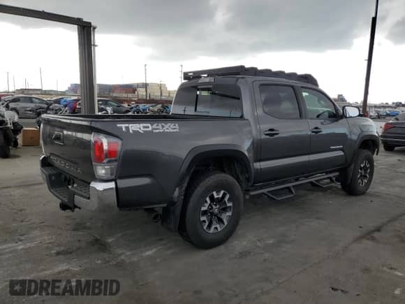 2021 Toyota Tacoma TRD Off Road with VIN 3TMCZ5AN4MM452580, listed as a Copart auction lot 84652395 with 20,866 mi miles and Salvage title. Bid and sale history available at DreamBid. Image 3.