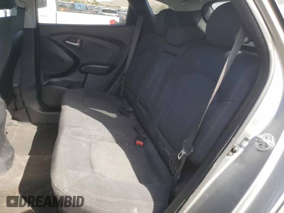 2012 Hyundai Tucson GL z VIN KM8JT3ABXCU339385, wystawiony jako Copart lot #50662705 z przebiegiem 150 378 mil mil oraz Szkoda całkowita • Salvage title. Historia ofert i sprzedaży dostępna na DreamBid. Obrazek 12.