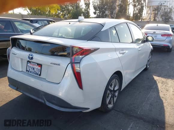 2017 Toyota Prius Two z VIN JTDKARFU2H3532848, wystawiony jako IAAI lot #42386490 z przebiegiem 140 728 mil mil oraz . Historia ofert i sprzedaży dostępna na DreamBid. Obrazek 4.