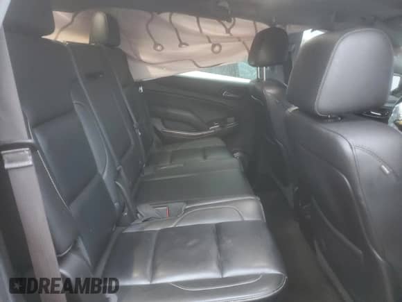 2015 Chevrolet Tahoe LT с VIN 1GNSKBKC5FR688899, выставлен на аукционе Copart как лот 81311665 с пробегом 165 706 миль миль и Списание • Salvage title. История ставок и продаж доступна на DreamBid. Изображение 11.