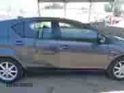 2015 Toyota Prius One z VIN JTDKDTB3XF1097121, wystawiony jako IAAI lot #42272691 z przebiegiem 124 485 mil mil oraz . Historia ofert i sprzedaży dostępna na DreamBid. Obrazek 13.