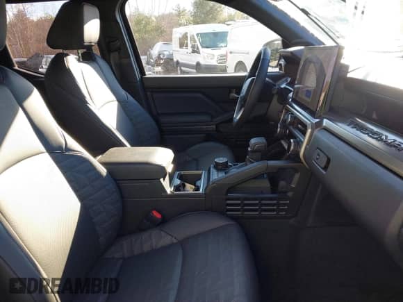 2024 Toyota Tacoma SR5 with VIN 3TMLB5JN0RM008463, listed as a IAAI auction lot 40979020 with 4,710 mi miles and . Bid and sale history available at DreamBid. Image 5.