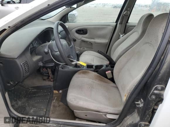 2001 Saturn SL with VIN 1G8ZF52891Z237485, listed as a Copart auction lot 76174574 with 130,525 mi miles and Salvage title. Bid and sale history available at DreamBid. Image 7.